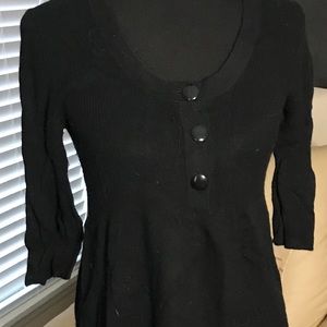 Women’s black knit dress.